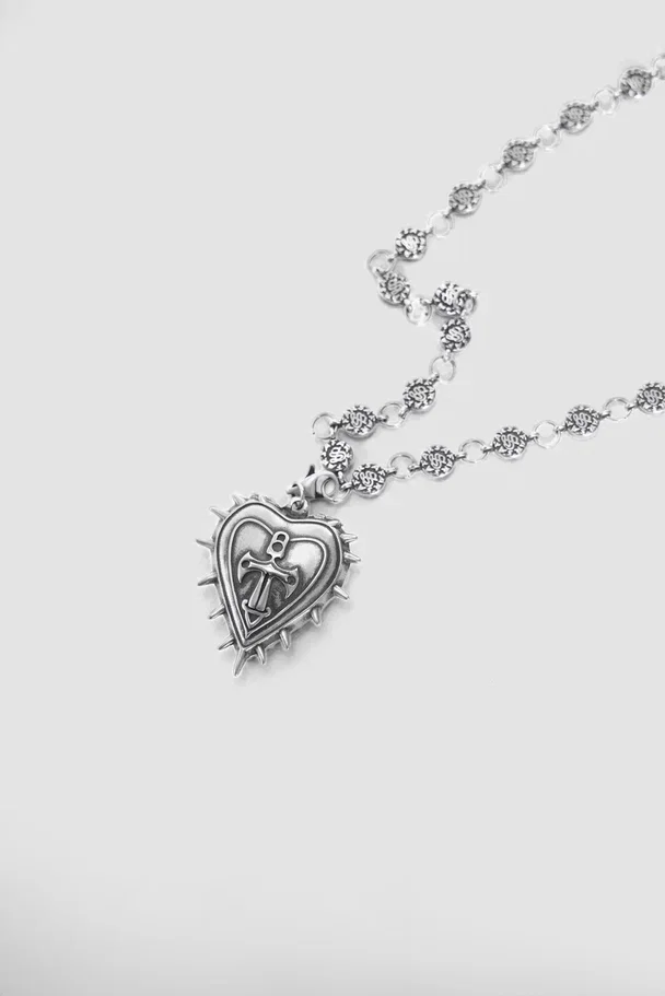 Heart locket pendant and chain, close-up